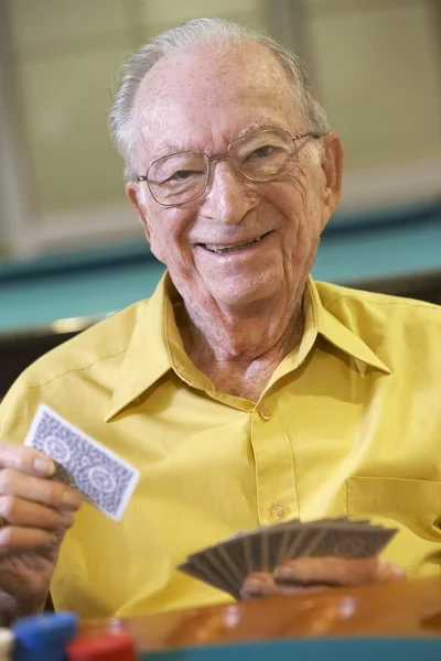 depositphotos 4790419 stock photo senior man playing bridge